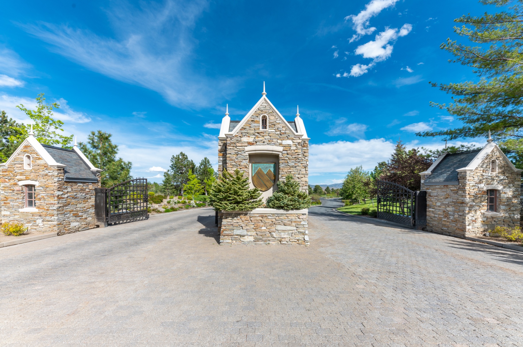 Stone gatehouse marking the private, guarded entrance to Montreux